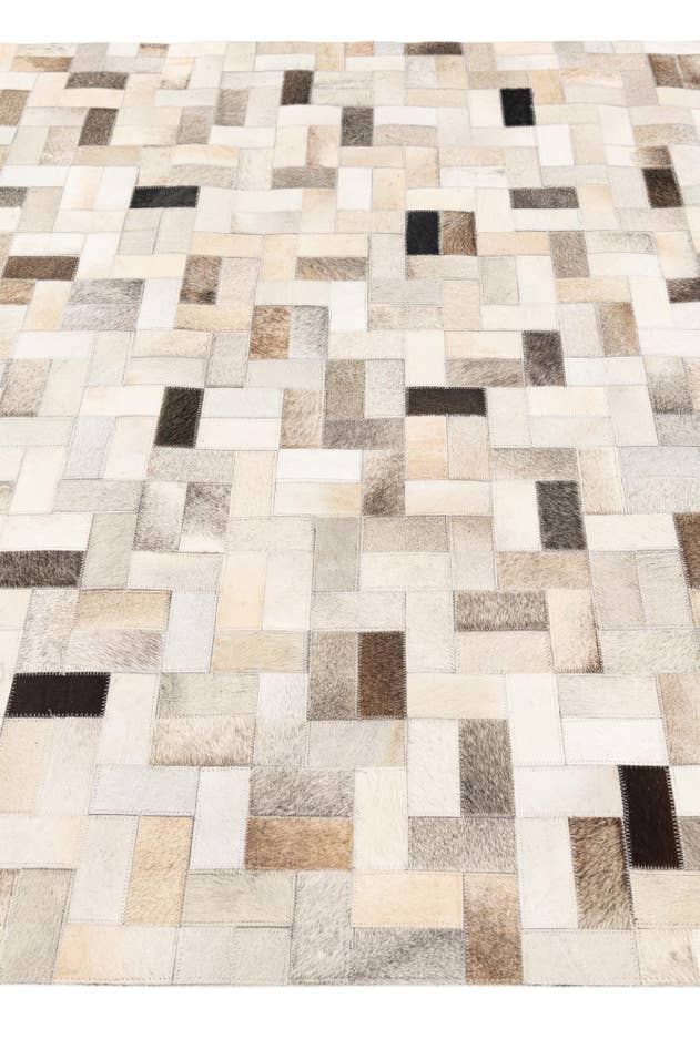 Detail image of 5' x 7' 11 Cowhide Stocks Rug