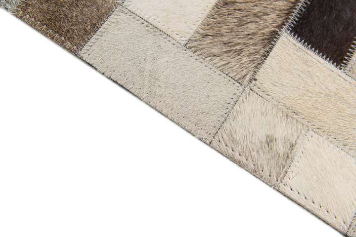 5' x 7' 11 Cowhide Stocks Rug