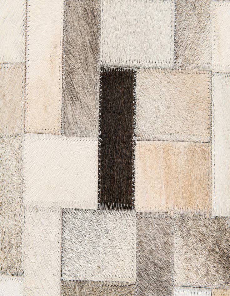Detail image of 5' x 7' 11 Cowhide Stocks Rug