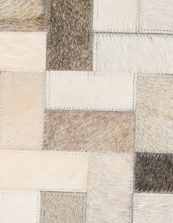 Detail image of 5' x 7' 11 Cowhide Stocks Rug