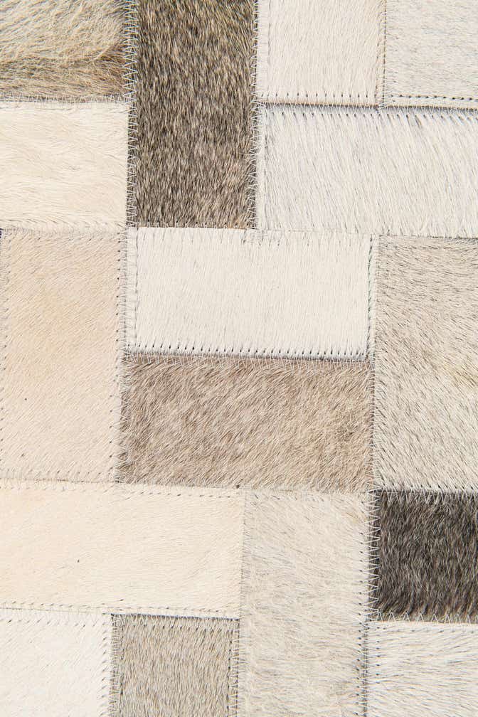 5' x 7' 11 Cowhide Stocks Rug