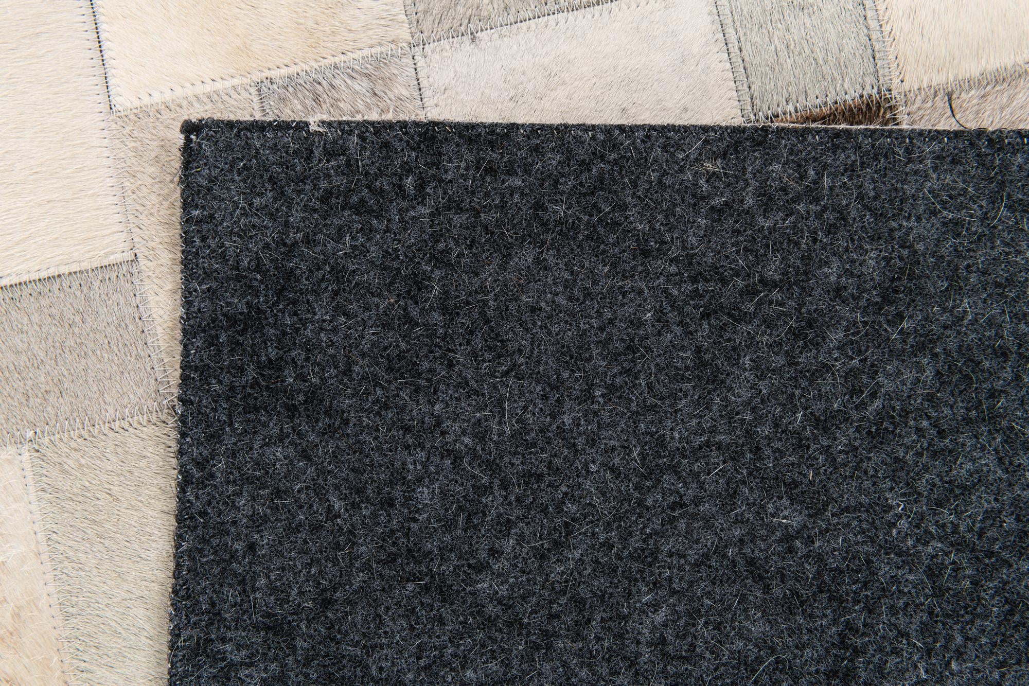 5' x 7' 11 Cowhide Stocks Rug