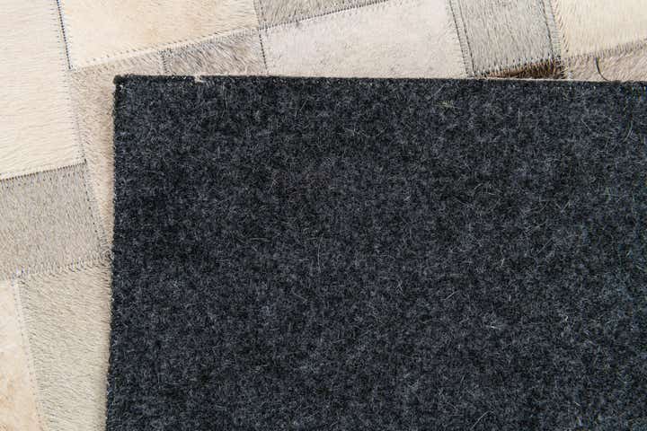 5' x 7' 11 Cowhide Stocks Rug