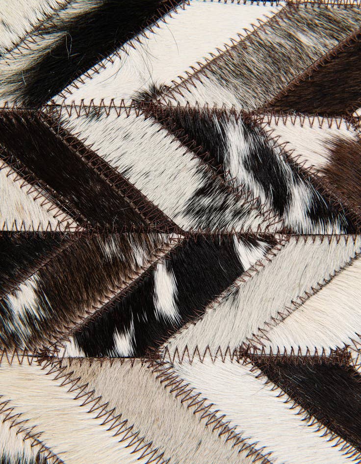 Detail image of 4' 11 x 7' 10 Cowhide Stocks Rug