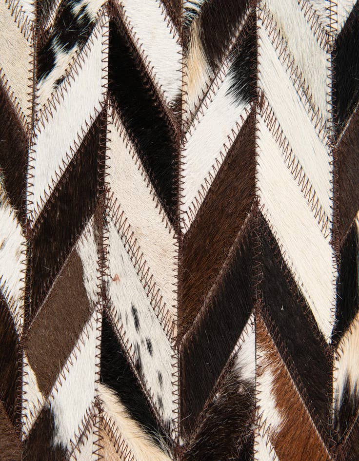 Detail image of 4' 11 x 7' 10 Cowhide Stocks Rug
