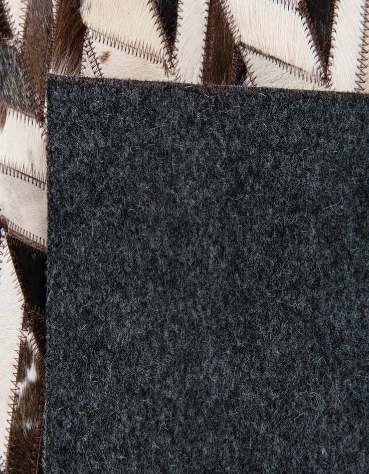 Detail image of 4' 11 x 7' 10 Cowhide Stocks Rug