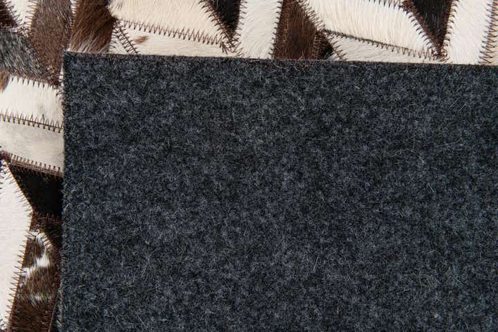 4' 11 x 7' 10 Cowhide Stocks Rug