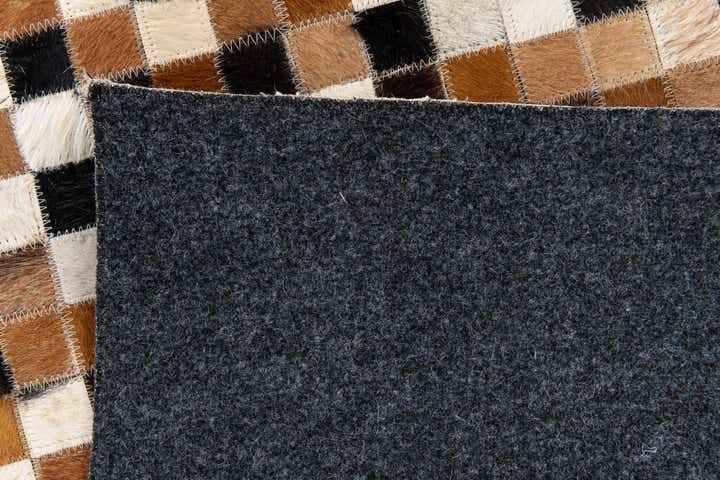 5' 5 x 7' 6 Cowhide Stocks Rug