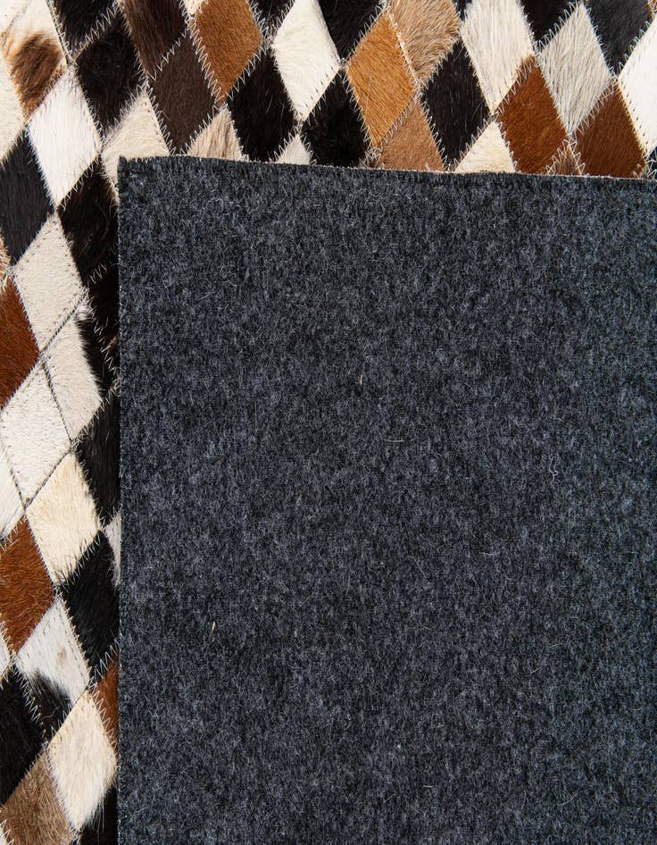 Detail image of 5' 3 x 7' 7 Cowhide Stocks Rug