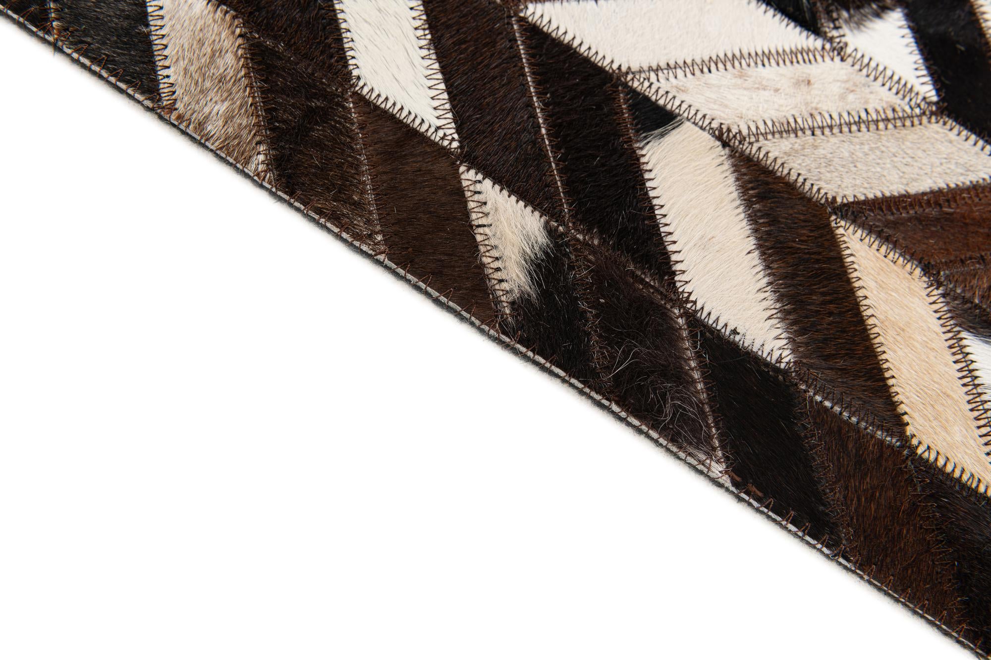 4' 11 x 8' Cowhide Stocks Rug