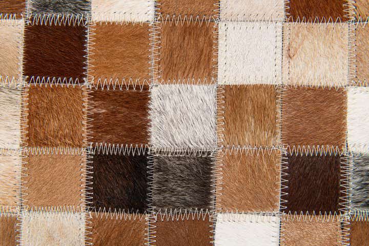 5' x 7' 10 Cowhide Stocks Rug