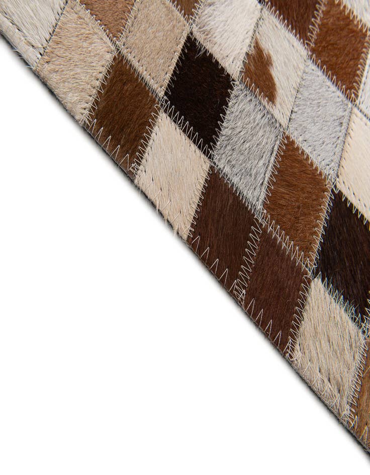 Detail image of 5' x 7' 11 Cowhide Stocks Rug
