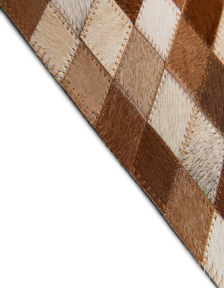 Detail image of 5' x 7' 10 Cowhide Stocks Rug