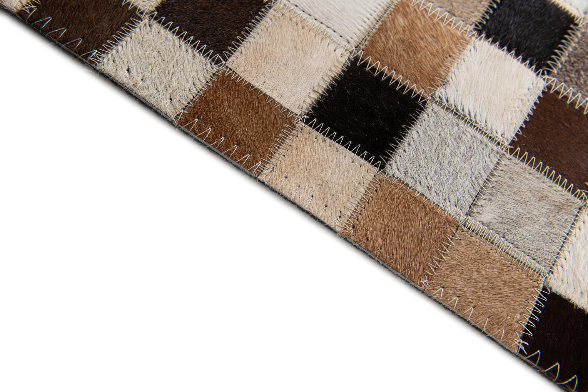 5' 1 x 7' 10 Cowhide Stocks Rug
