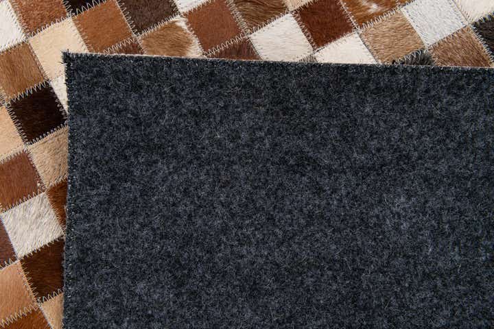 5' 1 x 7' 10 Cowhide Stocks Rug