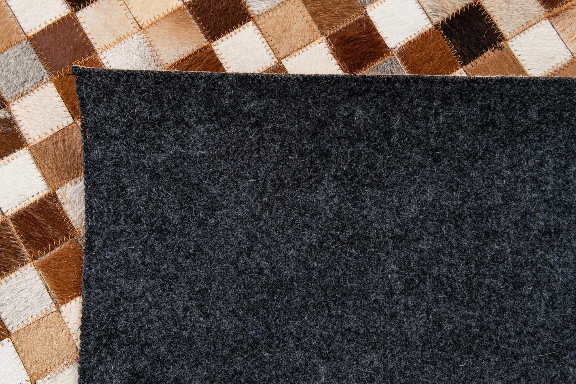 5' 2 x 8' Cowhide Stocks Rug