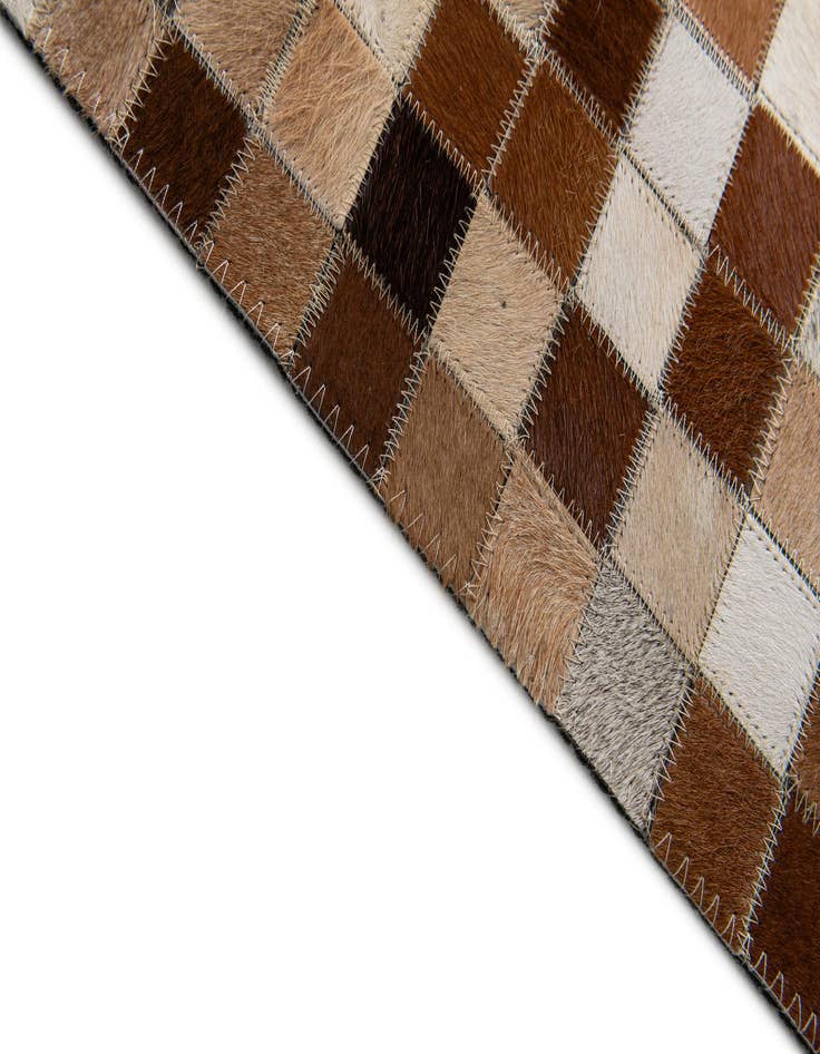 Detail image of 5' x 7' 11 Cowhide Stocks Rug