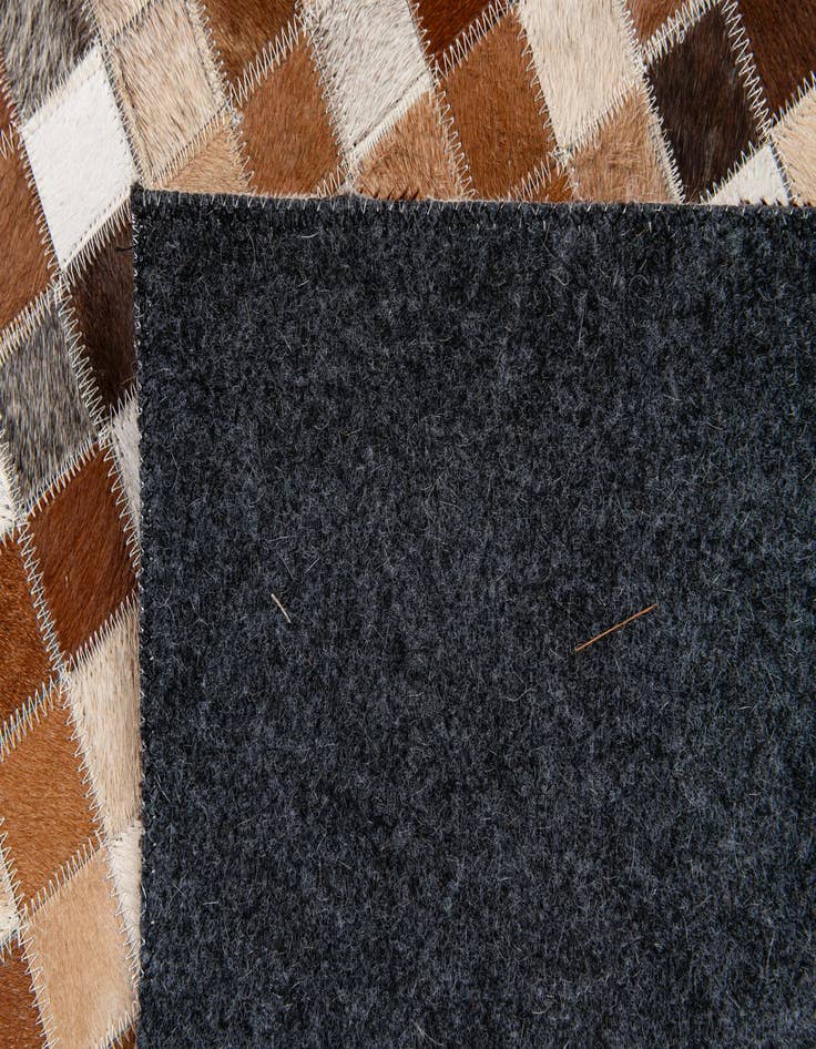 Detail image of 5' 1 x 7' 11 Cowhide Stocks Rug