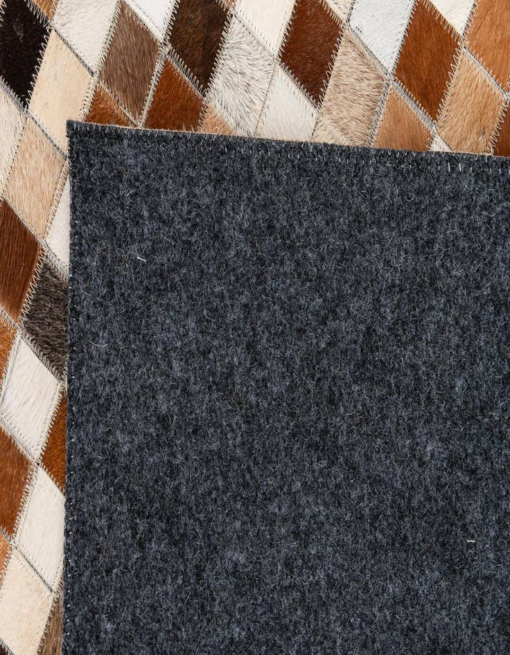 Detail image of 5' 1 x 7' 11 Cowhide Stocks Rug