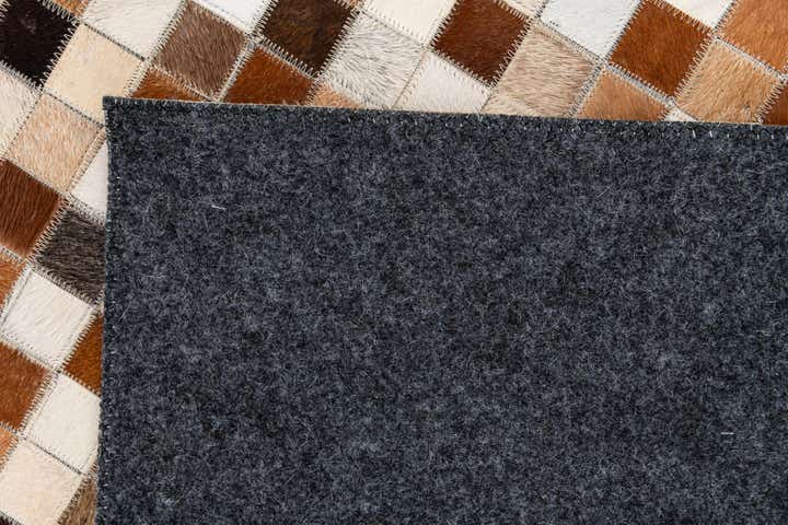 5' 1 x 7' 11 Cowhide Stocks Rug