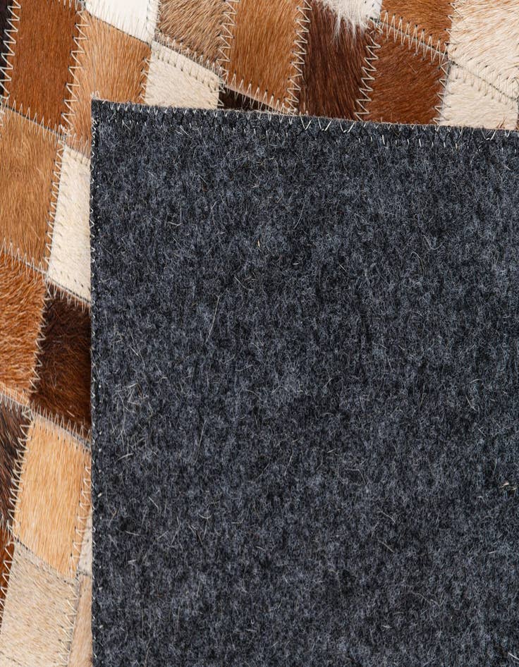 Detail image of 5' 1 x 7' 11 Cowhide Stocks Rug