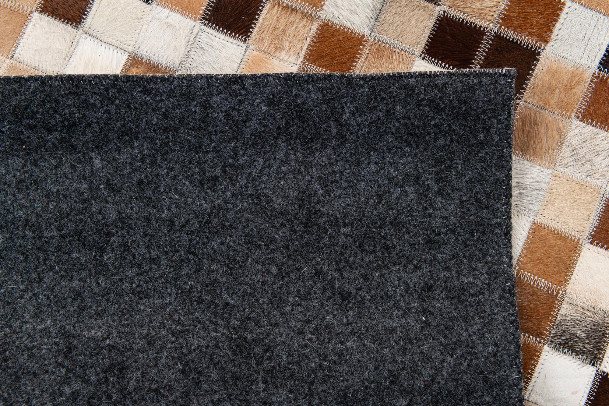 5' 1 x 7' 11 Cowhide Stocks Rug
