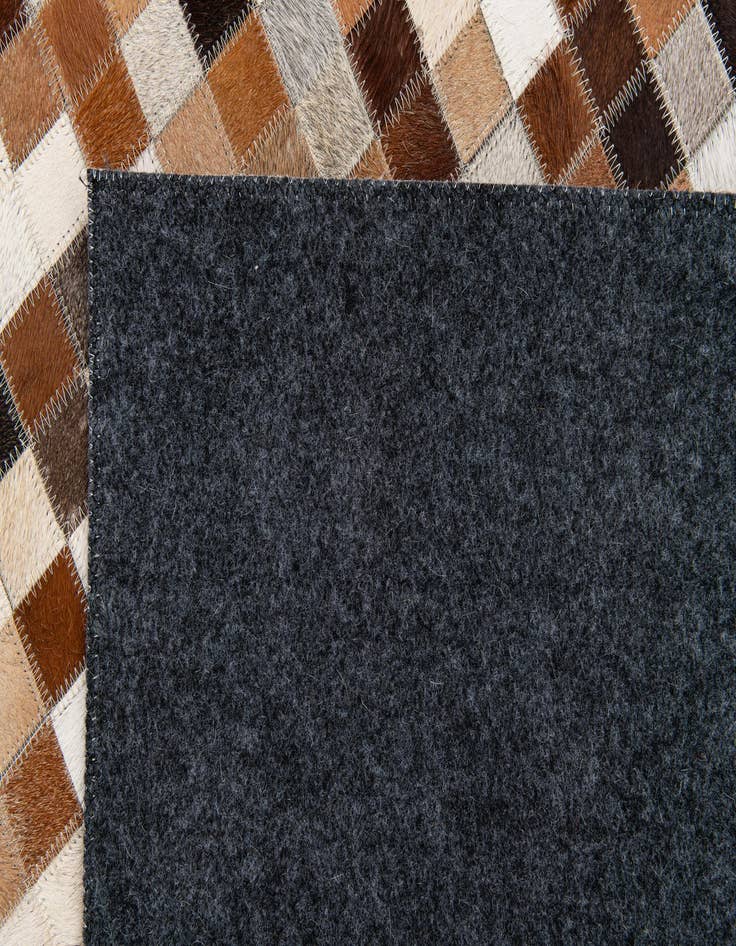 Detail image of 5' 1 x 7' 10 Cowhide Stocks Rug