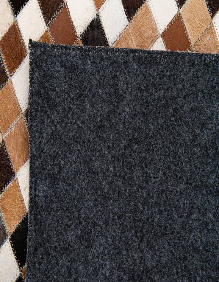Detail image of 5' 1 x 7' 11 Cowhide Stocks Rug