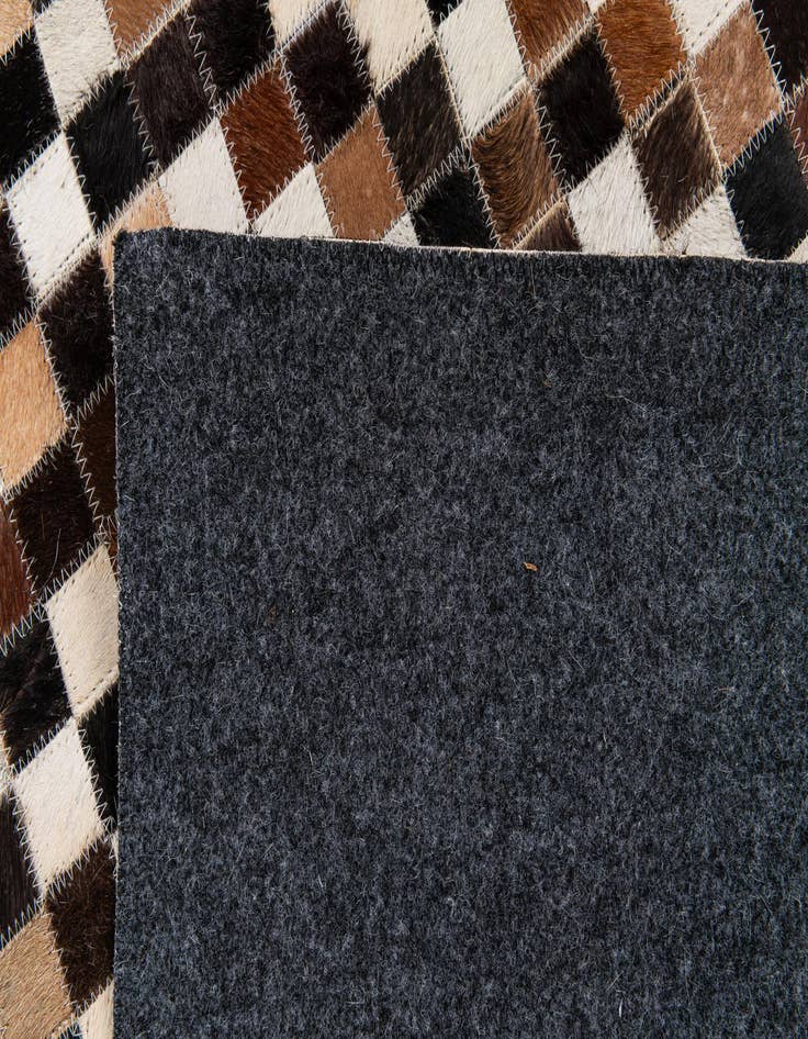 Detail image of 5' 5 x 7' 6 Cowhide Stocks Rug