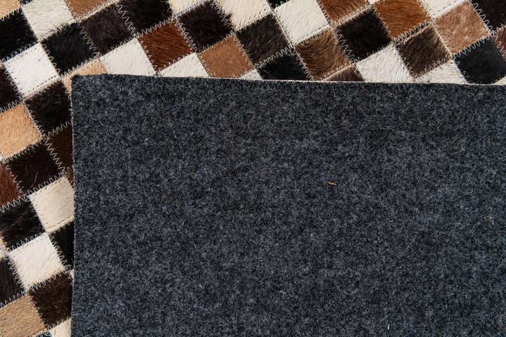 5' 5 x 7' 6 Cowhide Stocks Rug