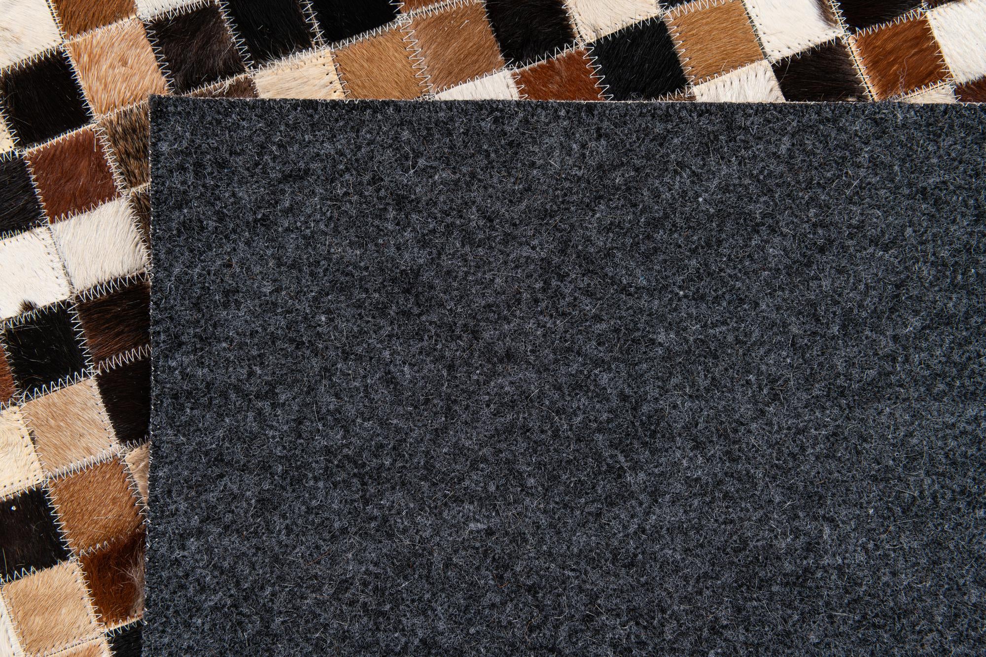 5' 5 x 7' 9 Cowhide Stocks Rug