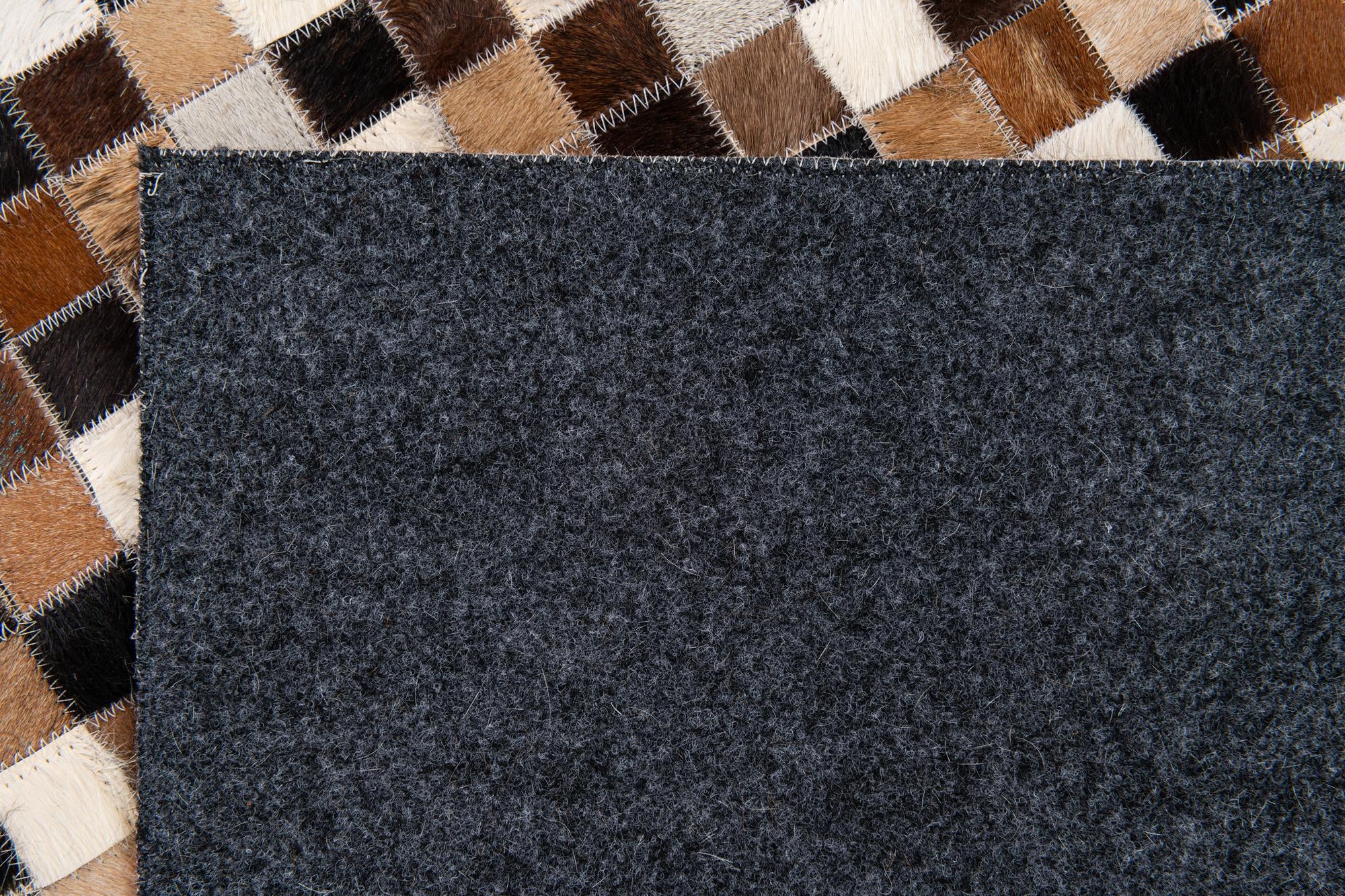 5' 3 x 7' 7 Cowhide Stocks Rug