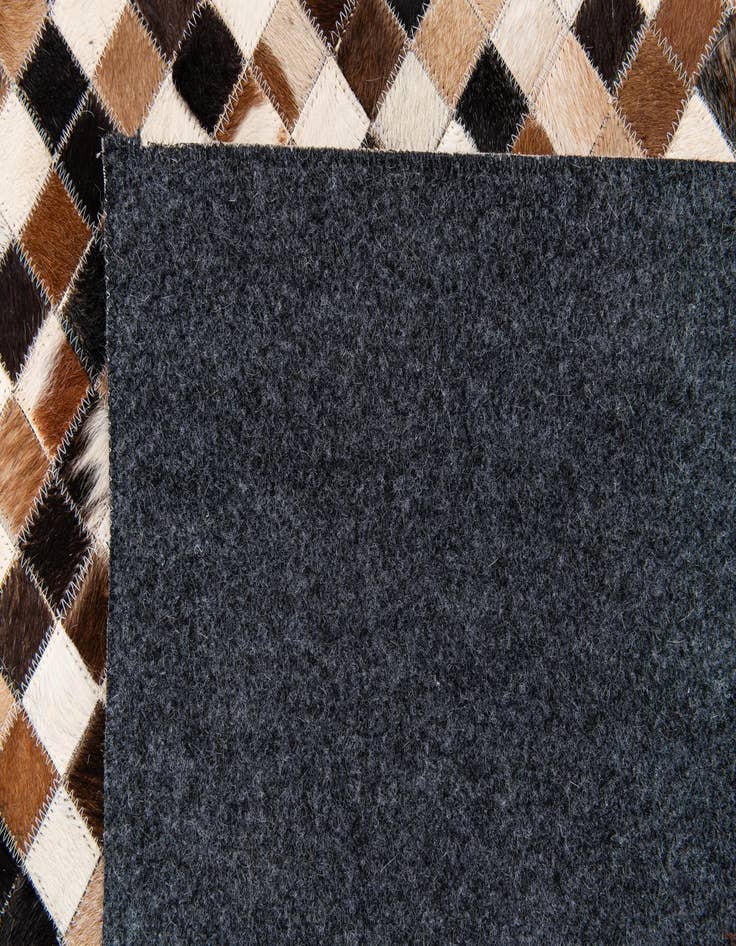 Detail image of 5' 3 x 7' 7 Cowhide Stocks Rug