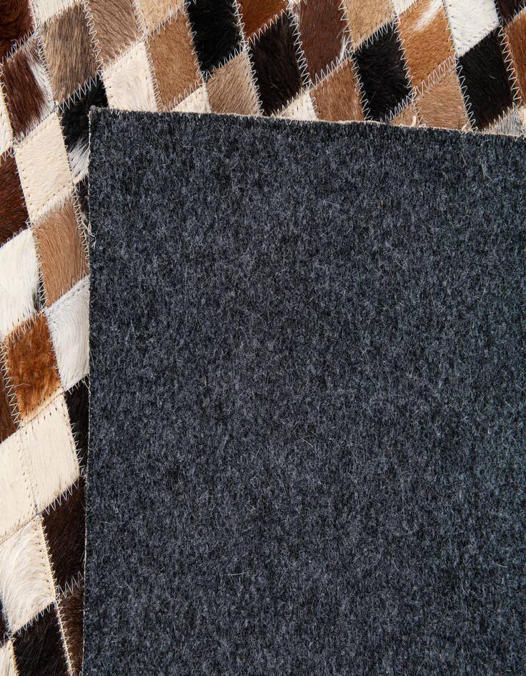 Detail image of 5' 5 x 7' 8 Cowhide Stocks Rug