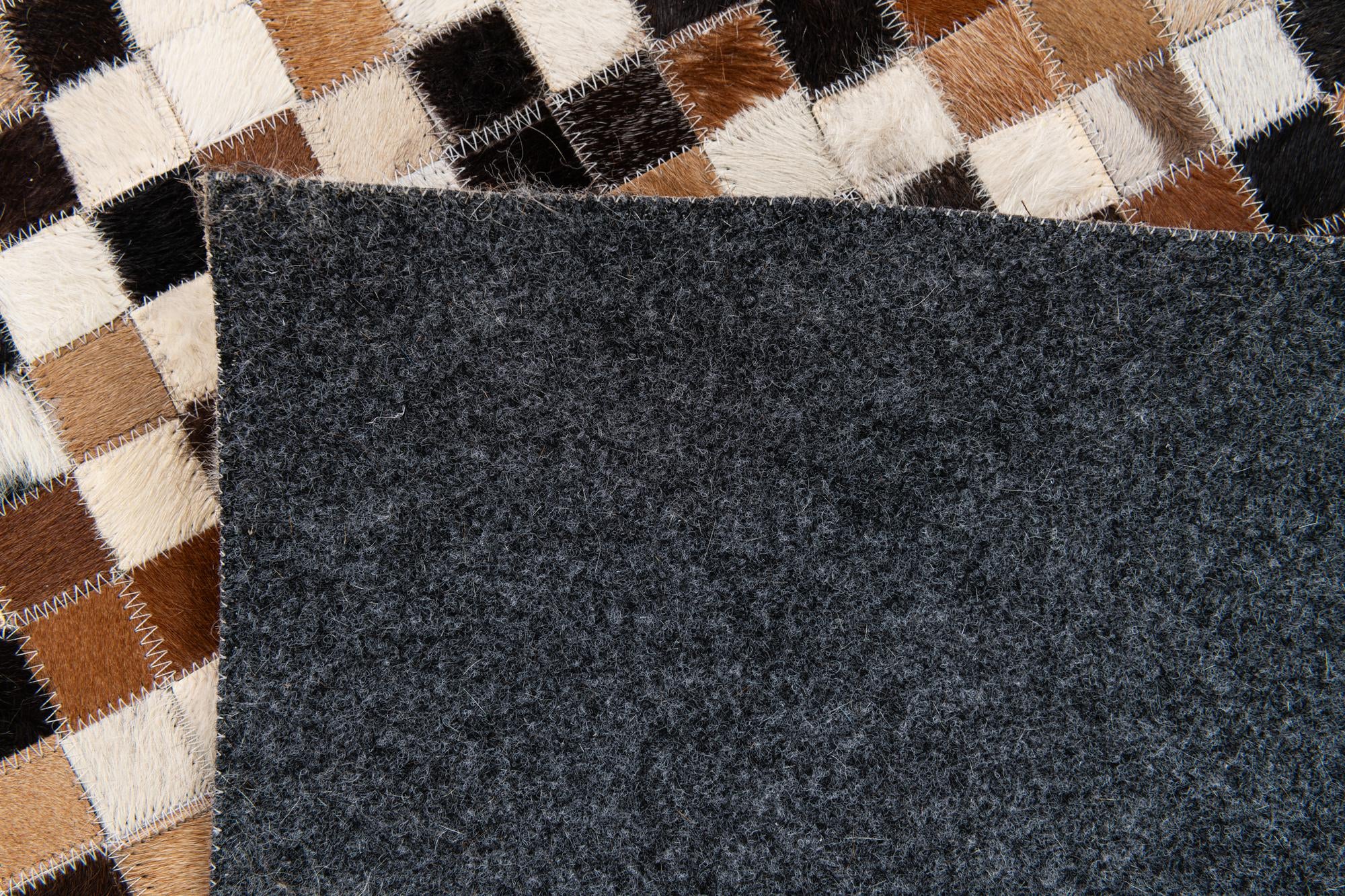 5' 5 x 7' 7 Cowhide Stocks Rug