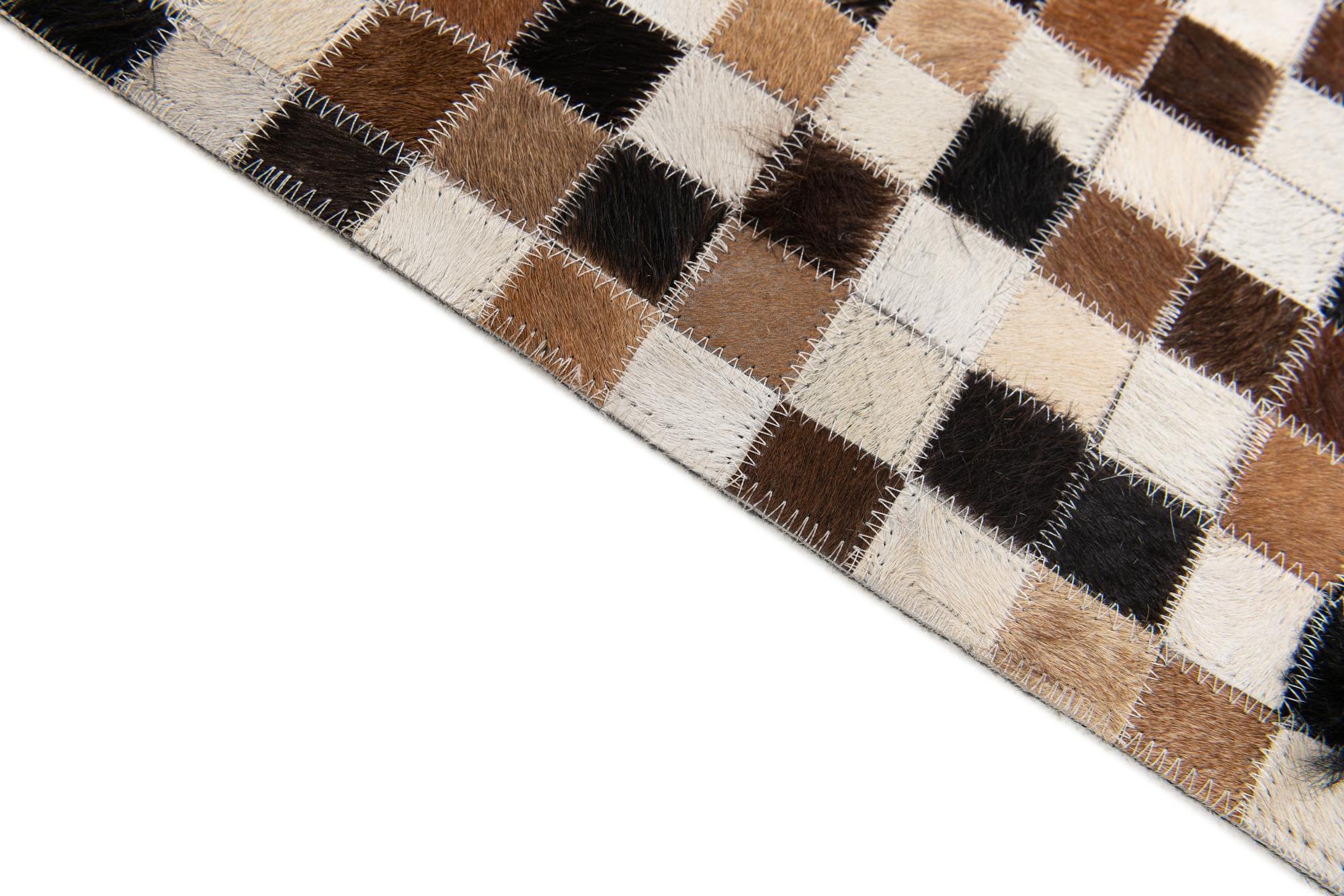 5' 7 x 7' 6 Cowhide Stocks Rug