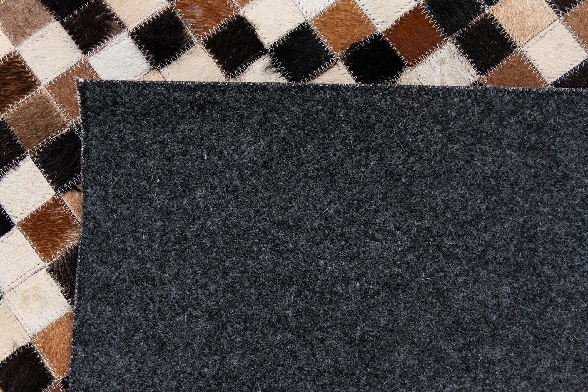 5' 7 x 7' 6 Cowhide Stocks Rug