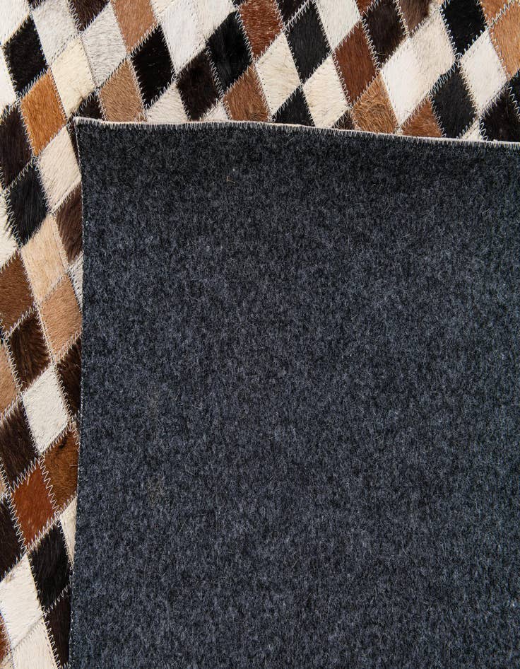 Detail image of 5' 6 x 7' 7 Cowhide Stocks Rug