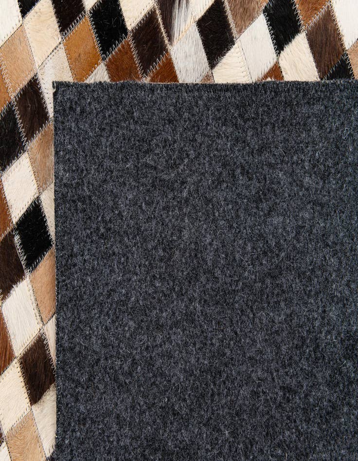 Detail image of 5' 3 x 7' 6 Cowhide Stocks Rug