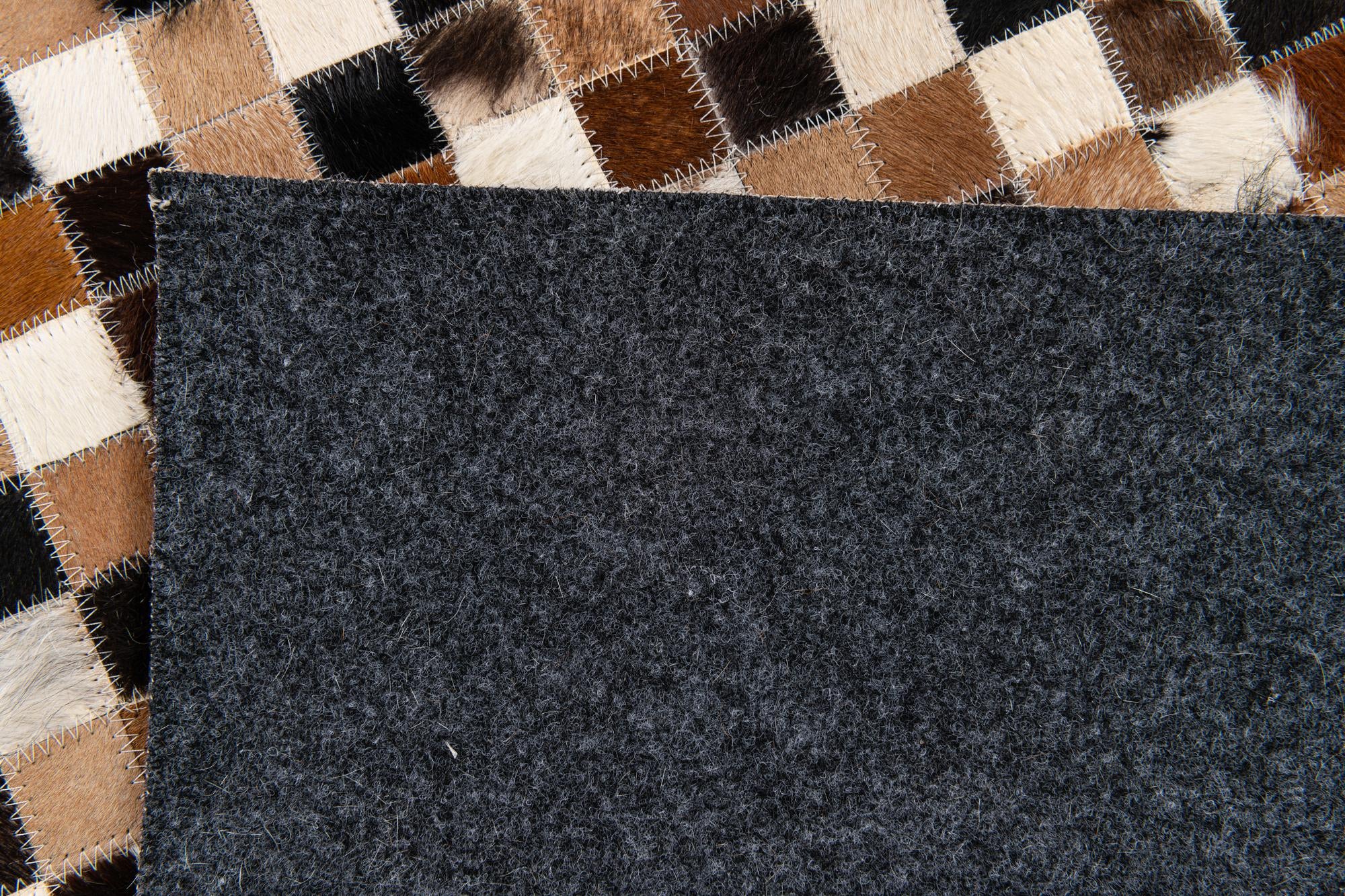 5' 5 x 7' 7 Cowhide Stocks Rug
