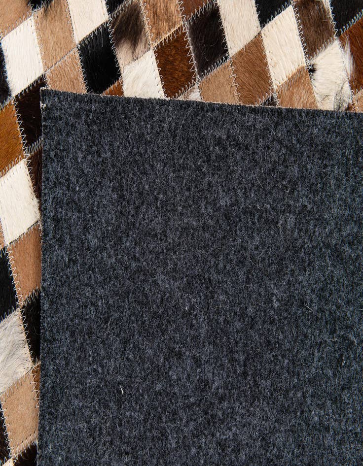Detail image of 5' 5 x 7' 7 Cowhide Stocks Rug