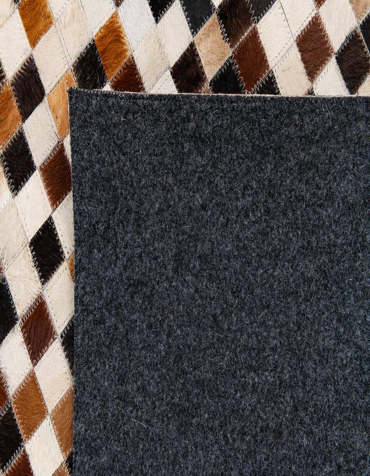 Detail image of 5' 5 x 7' 8 Cowhide Stocks Rug