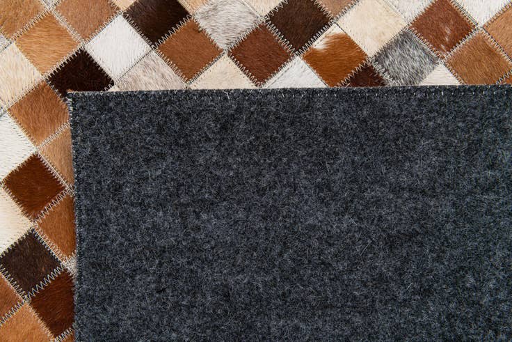 Detail image of 5' x 8' Cowhide Stocks Rug