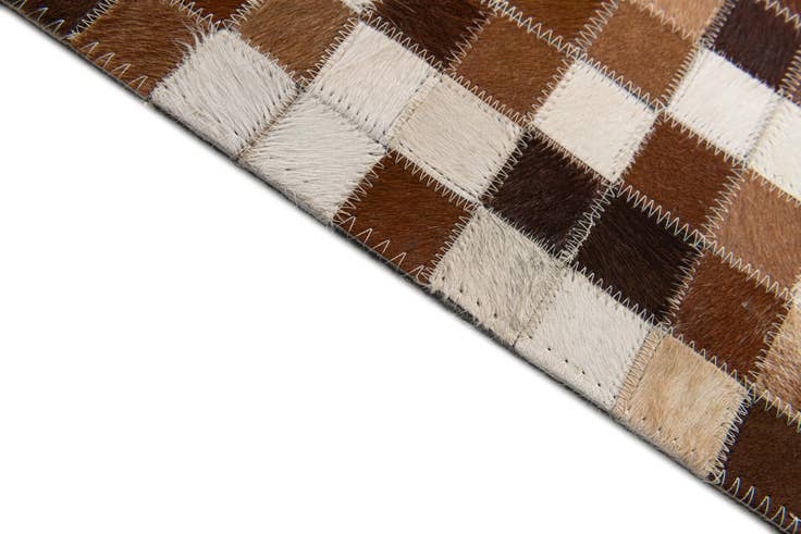 Detail image of 5' x 7' 11 Cowhide Stocks Rug