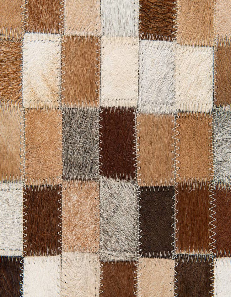 Detail image of 5' x 7' 11 Cowhide Stocks Rug
