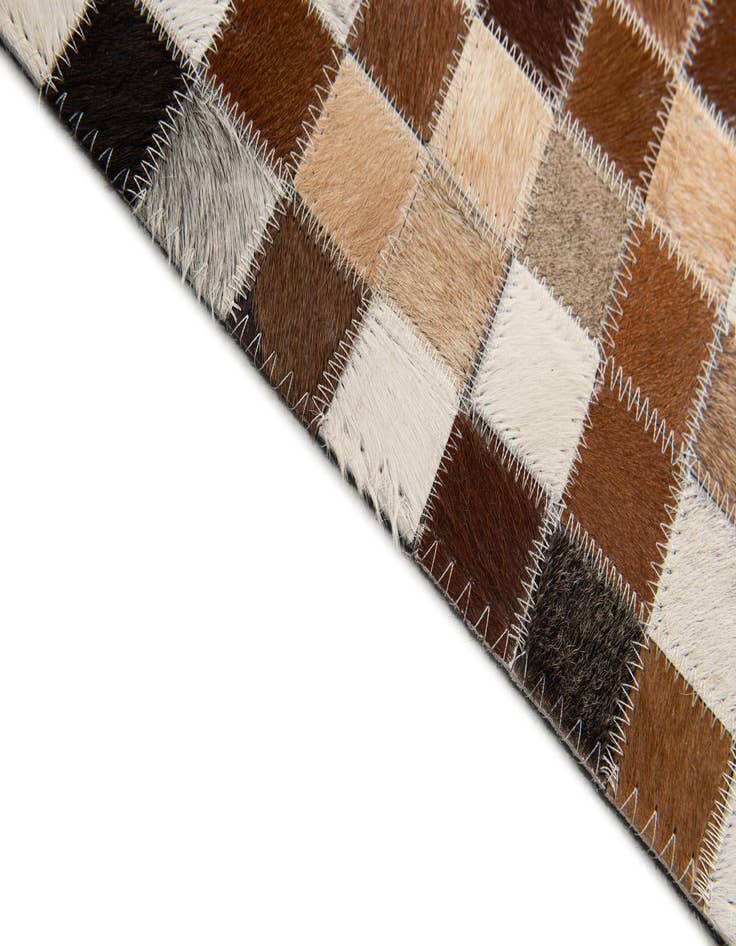 Detail image of 5' x 7' 11 Cowhide Stocks Rug