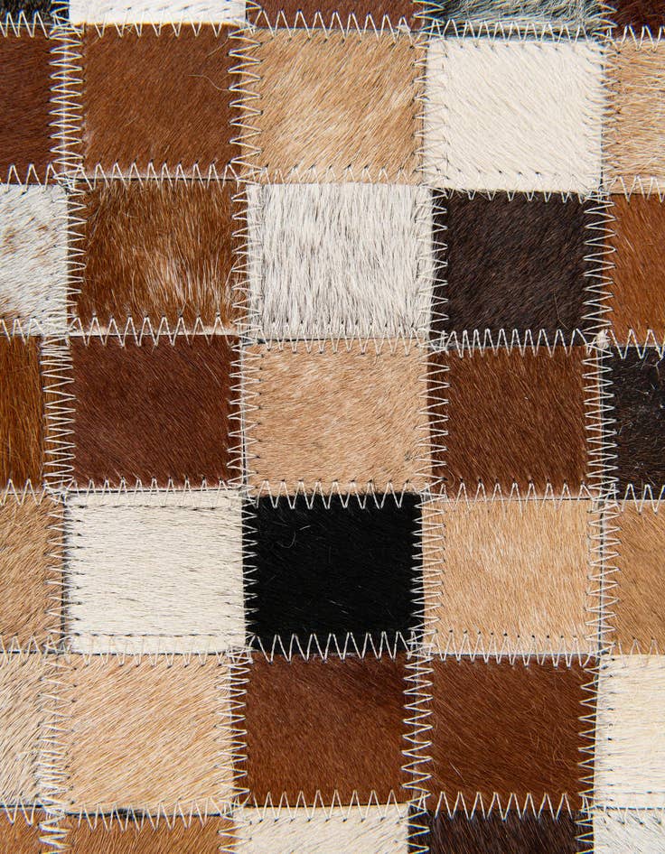 Detail image of 5' x 7' 11 Cowhide Stocks Rug