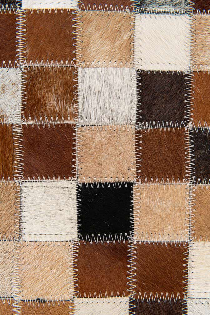 5' x 7' 11 Cowhide Stocks Rug