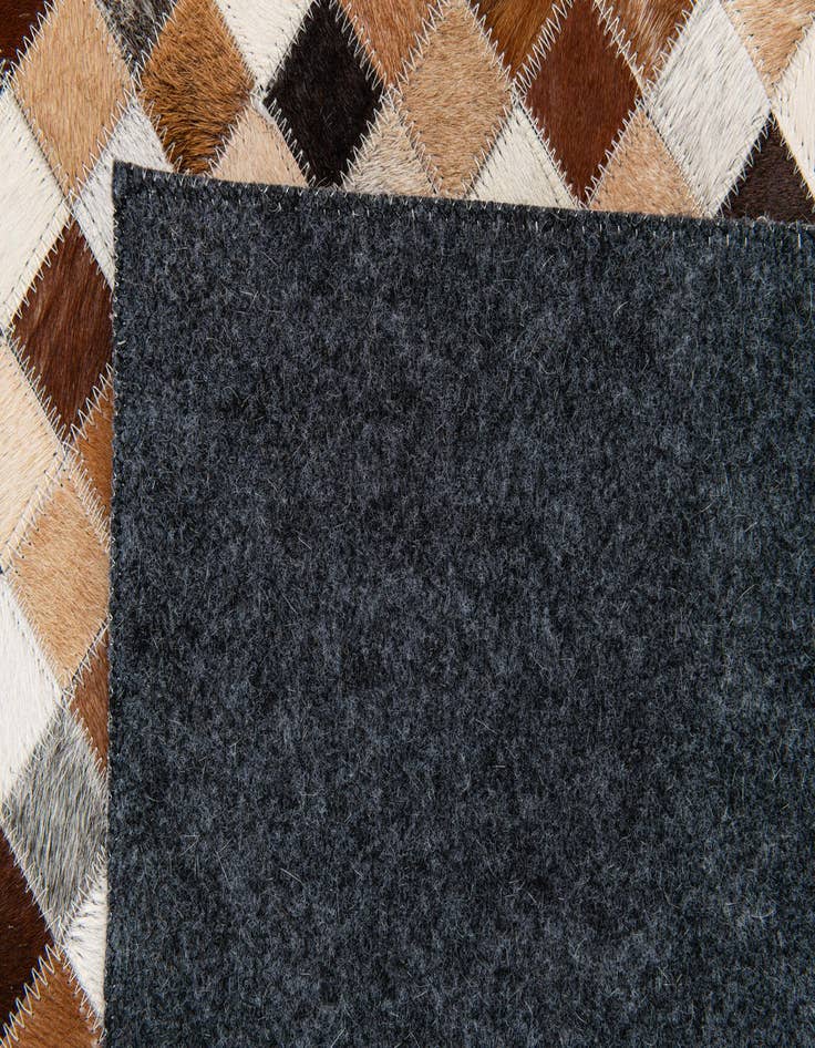 Detail image of 5' x 7' 11 Cowhide Stocks Rug