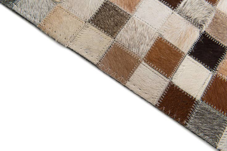 Detail image of 5' x 7' 11 Cowhide Stocks Rug